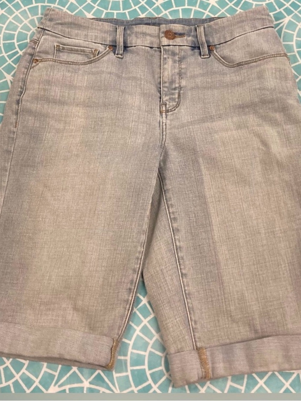 Chico’s light blue denim “So Slimming Girlfriend Short” Bermuda shorts.
